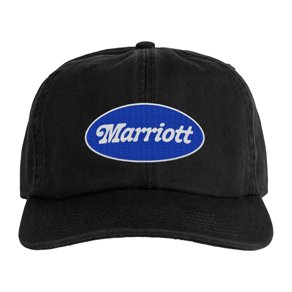 Black cap with James Marriott logo on front.